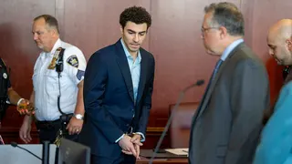 Luigi Mangione seated in courtroom during evidence suppression hearing