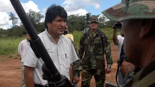 Bolivia's President Evo Morales greeting a member of Bolivia's anti-drugs forces in Santa Cruz province