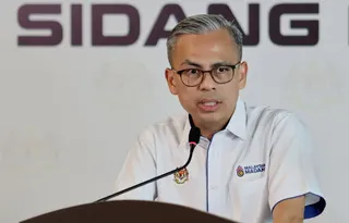 Communications Minister Datuk Fahmi Fadzil speaking at a press conference after a post-cabinet briefing in Putrajaya today. - NSTP/MOHD FADLI HAMZAH