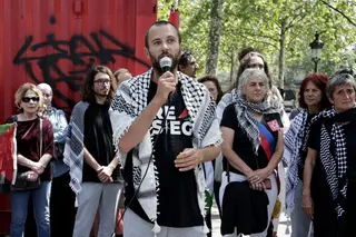 Adrien, a French sailor and member of the Global Sumud flotilla, speaks as French activists of the flotilla and protesters gather to take part in a pro-Palestinian demonstration in Paris, France on May 23, 2026.
