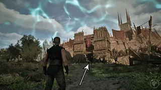 An arrow points to the Old Camp's northern gate in Gothic 1 Remake.