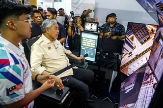 Deputy Prime Minister Datuk Seri Dr Ahmad Zahid Hamidi at one of the booths during a walkabout at National TVET Day 2026 at Dataran Putrajaya today. - NSTP/ AHMAD UKASYAH