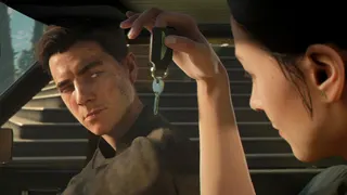 Isola waves a car key at an unimpressed Bond.