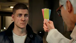 Q brandishes colour cards at a gormless Bond.