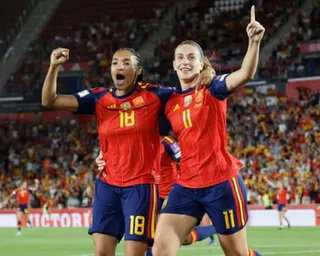 Spain's Alexia Putellas (R) celebrates with Salma Paralluelo after scoring her team's second goal against England