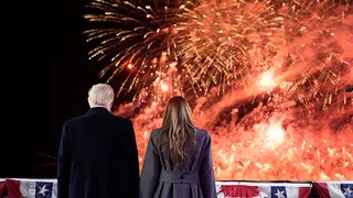 Then-President-elect Donald Trump and Melania Trump watching fireworks at Trump National Golf Club in Sterling, Virginia