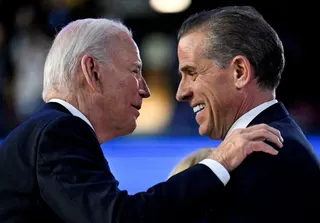 US President Joe Biden greets his son Hunter Biden at the Democratic National Convention (DNC) in Chicago August 19, 2024. — Reuters pic