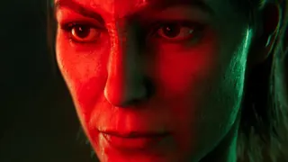 Star Trek: Shadow Frontier screenshot showing a close-up of protagonist Ro Laren's face bathed in eerie red light.
