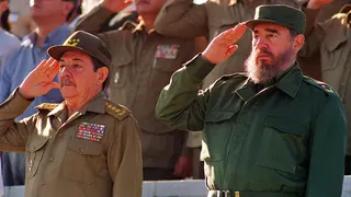 Fidel Castro and his brother Raul Castro attending a parade in Havana Cuba