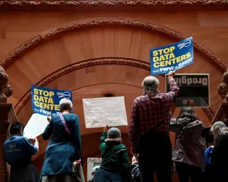 Advocates and progressive lawmakers hold a rally in support of moratorium on new datacenters in May in New York.