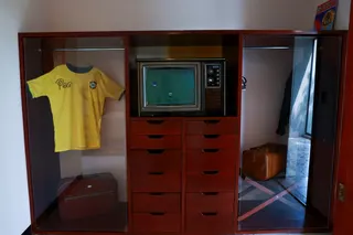 A jersey of Brazilian legend Pele, the original closet and a television remain in the room where he stayed ahead of the 1970 World Cup final in Mexico City. — Reuters pic