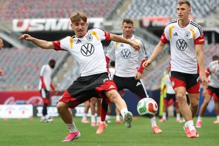 Lennart Karl of Germany (left) plays the ball during a Team Germany Training session at Soldier Field on June 5, 2026 in Chicago, Illinois. — Getty Images via AFP