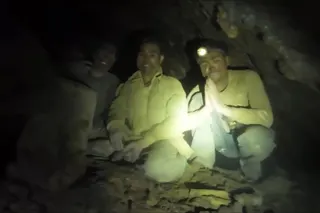 Screengrab shows people trapped in a flooded cave in Xaysomboun province, northeast of Vientiane in Laos on May 27, 2026, with the fate of two of them unknown. — Handout pic by Benz Norrased Palasing/Seascout Diving via AFP