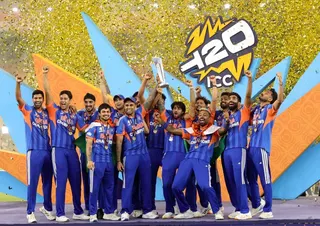 Cricket - ICC Men's T20 World Cup 2026 - Final - India v New Zealand - Narendra Modi Stadium, Ahmedabad, India - March 8, 2026 India's Suryakumar Yadav lifts the trophy as he celebrates with teammates after winning the ICC Men's T20 World Cup REUTERS/Amit Dave TPX IMAGES OF THE DAY
