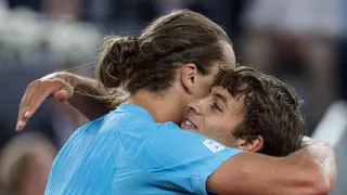 Alexander Zverev hugs Flavio Cobolli after their match at the 2026 Madrid Open