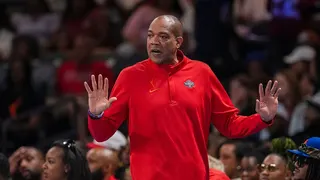 Washington Mystics head coach Sydney Johnson reacting during a basketball game