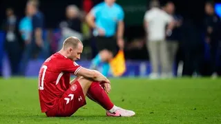Denmark's Christian Eriksen collapses during match against Ukraine