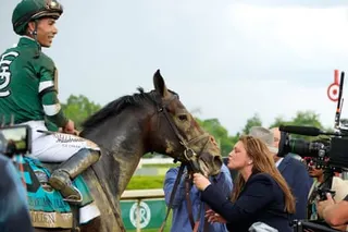 Trainer Cherie DeVaux, right, greets Golden Tempo jockey Jose Ortiz after they won the 158th running of the Belmont Stakes on Saturday.