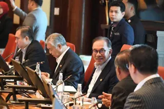 DAP secretary-general Anthony Loke (left) seated next to Deputy Prime Minister Datuk Seri Dr Ahmad Zahid Hamidi in a meeting. ANTHONY LOKE SIEW FOOK FB PAGE