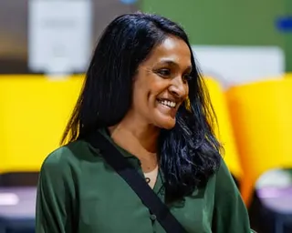 a woman smiles