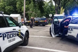 police vehicles at a crime scene