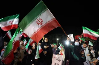 Iranians attend a rally in Tehran after Iran’s attack on Israel on Sunday. Photo: EPA