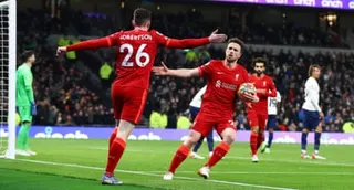 Diogo Jota celebrates with Andy Robertson after scoring against Tottenham in December 2021.