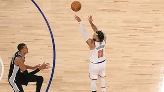 Jalen Brunson shooting a three-point basket over Victor Wembanyama at Madison Square Garden