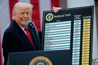 US President Donald Trump holds a chart as he delivers remarks on so-called “reciprocal tariffs” during an event at the White House in April, 2025. Photo: AFP