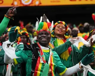 Senegal fans smile and dance