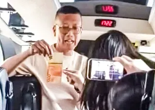 A Hong Kong school has instantly dismissed its principal after he was filmed swearing at security guards in Singapore. Photo: Handout