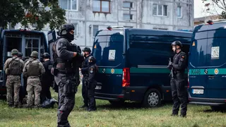 Lithunanian armed special forces and members of the Lithuanian Riflemen’s Union take part in a military exercise in central Lithuania [File: Nils Adler/Al Jazeera]