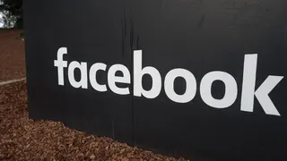 Sign with Facebook logo at company headquarters in Menlo Park California