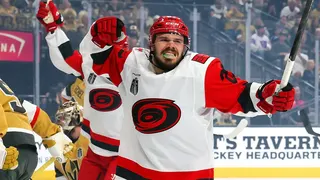 Logan Stankoven of the Carolina Hurricanes celebrates after scoring a goal at T-Mobile Arena in Las Vegas