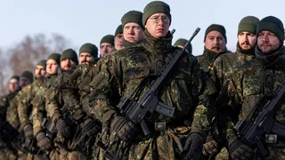 KAUNAS, LITHUANIA - FEBRUARY 4: German Bundeswehr troops march during a public ceremony to mark the expansion of Germany's Lithuania military commitment on February 4, 2026 in Kaunas, Lithuania. Germany leads a multi-national, NATO contingent in Lithuania with its Lithuania Armoured Brigade 45. The unit was recently expanded to include two additional armoured infantry battalions. Germany is building a new military base in southeastern Lithuania that will accommodate up to 5,000 personnel. (Photo