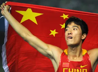 China’s Liu Xiang is now the seventh fastest 110m hurdler of all time. Photo: AFP