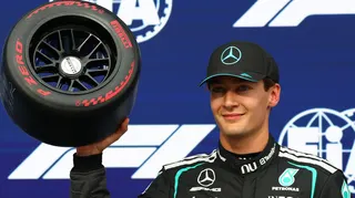 Mercedes driver George Russell holds aloft the Pirelli pole position at the 2026 Canadian Grand Prix