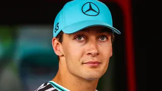 George Russell pictured wearing a Mercedes cap at the Monaco Grand Prix