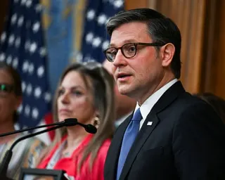 a man speaks into a microphone