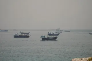Vessels are anchored in the Strait of Hormuz, as seen from Musandam, Oman, June 11, 2026. REUTERS/Stringer