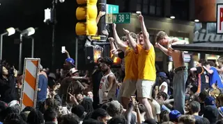 Getty Images New York Knicks fans celebrate outside Madison Square Garden after their team's Game 4 victory.