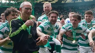 Martin O'Neill celebrates the Scottish Premiership title with his Celtic players