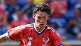 Scott McTominay in action for Scotland in the team's largely red change kit
