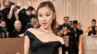 Ariana Grande standing on the red carpet at the Golden Globe Awards in Beverly Hills