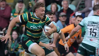 Tom Litchfield breaks through Leicester's defence to score Northampton's first try