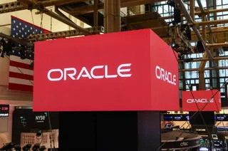 Oracle Corp. signage on the floor of the New York Stock Exchange (NYSE) in New York, US, on Friday, April 10, 2026.