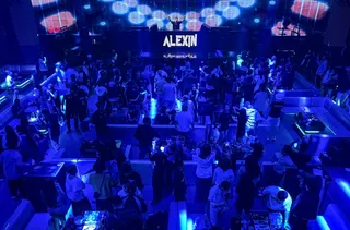 In a blaring nightclub in wartime Myanmar, partied-out revellers doze until dawn by the dancefloor, wary of journeying home despite the end of a post-coup curfew. — AFP pic