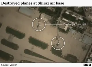 A satellite image showing damage to aircraft at Shiraz air base. The photo shows two destryoed planes sitting on the runway.