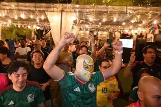 Against the backdrop of a former convent, around 200 fans stayed on past their bedtimes and braved the muggy weather to watch the World Cup opener.