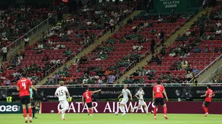 South Korea and Czech Republic play in front of a stand with a number of empty seats